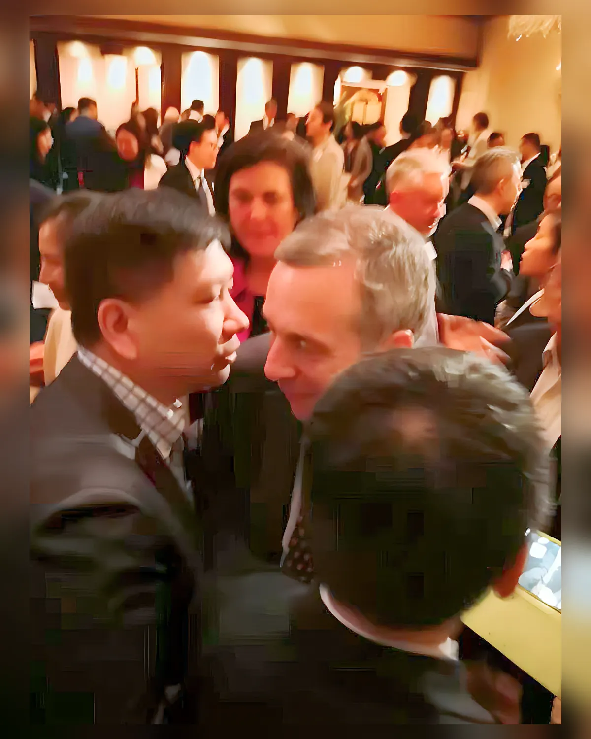 In close conversation with Harvard University President Lawrence Bacow.