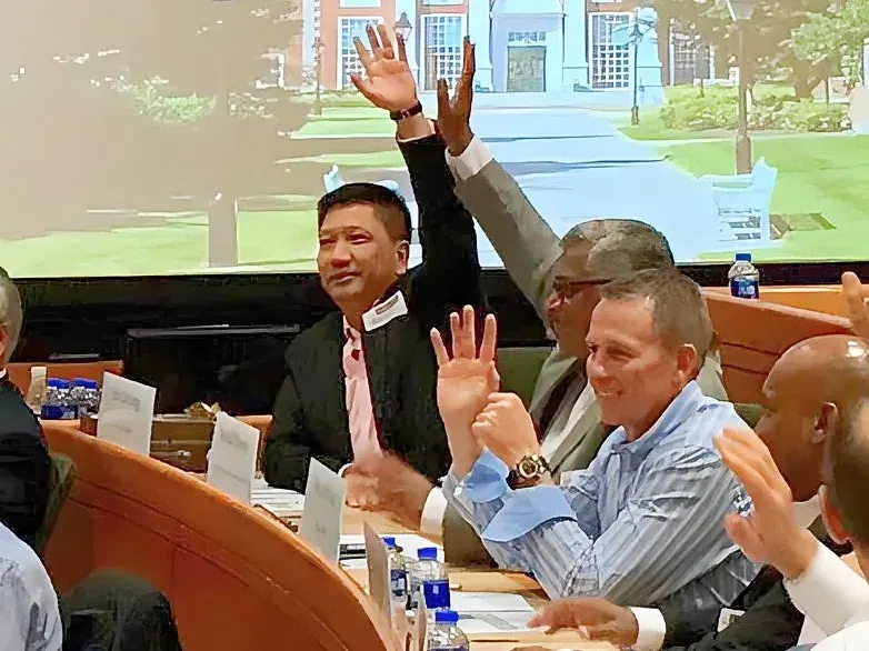 Eric Cheung with AMP 184 classmates at Harvard Business School