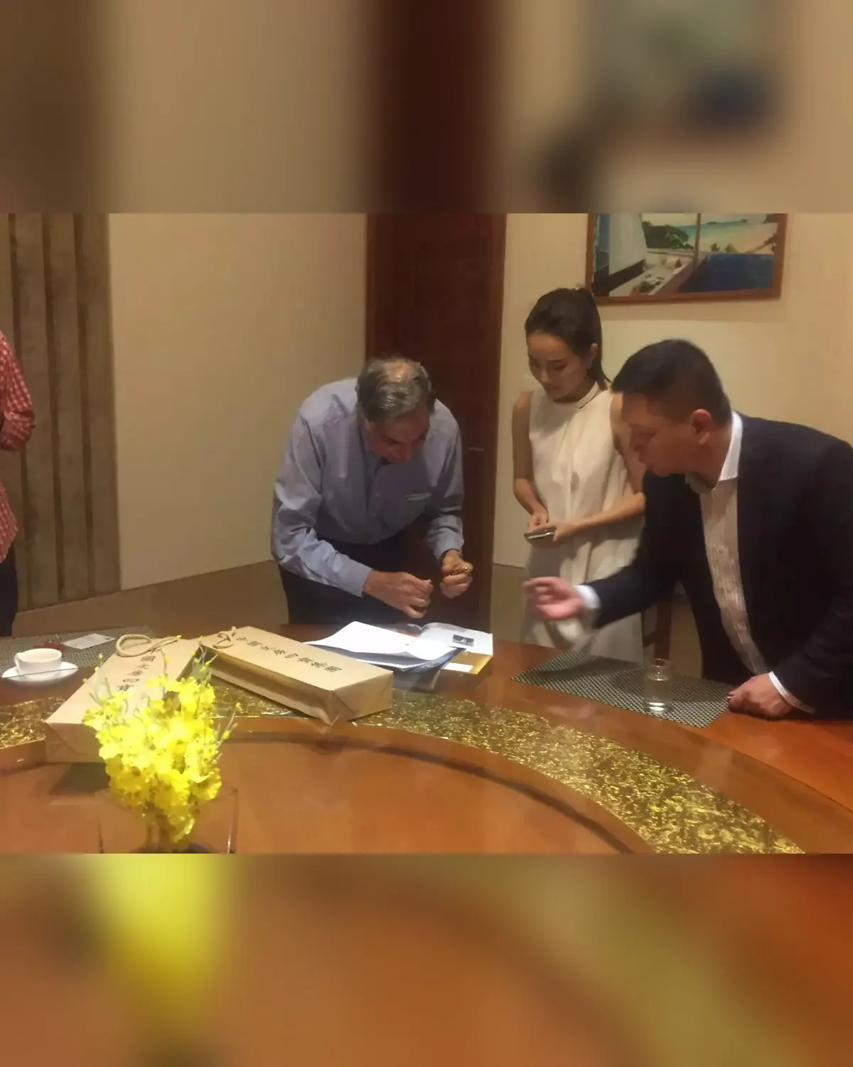Mr. Ratan Tata signing a book for me.
